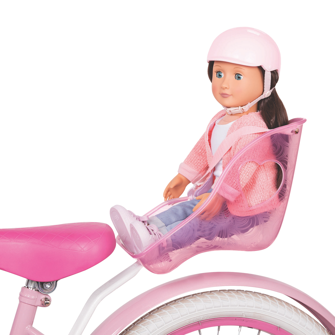 18-inch doll in toy bike seat