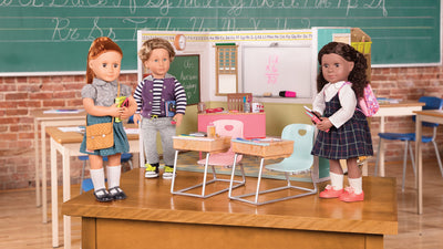 Three Dolls playing with a Classroom Playset