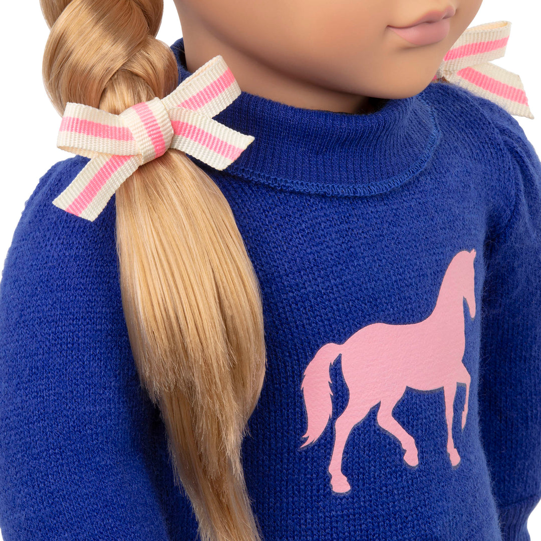 18-inch equestrian doll with blonde hair and green eyes