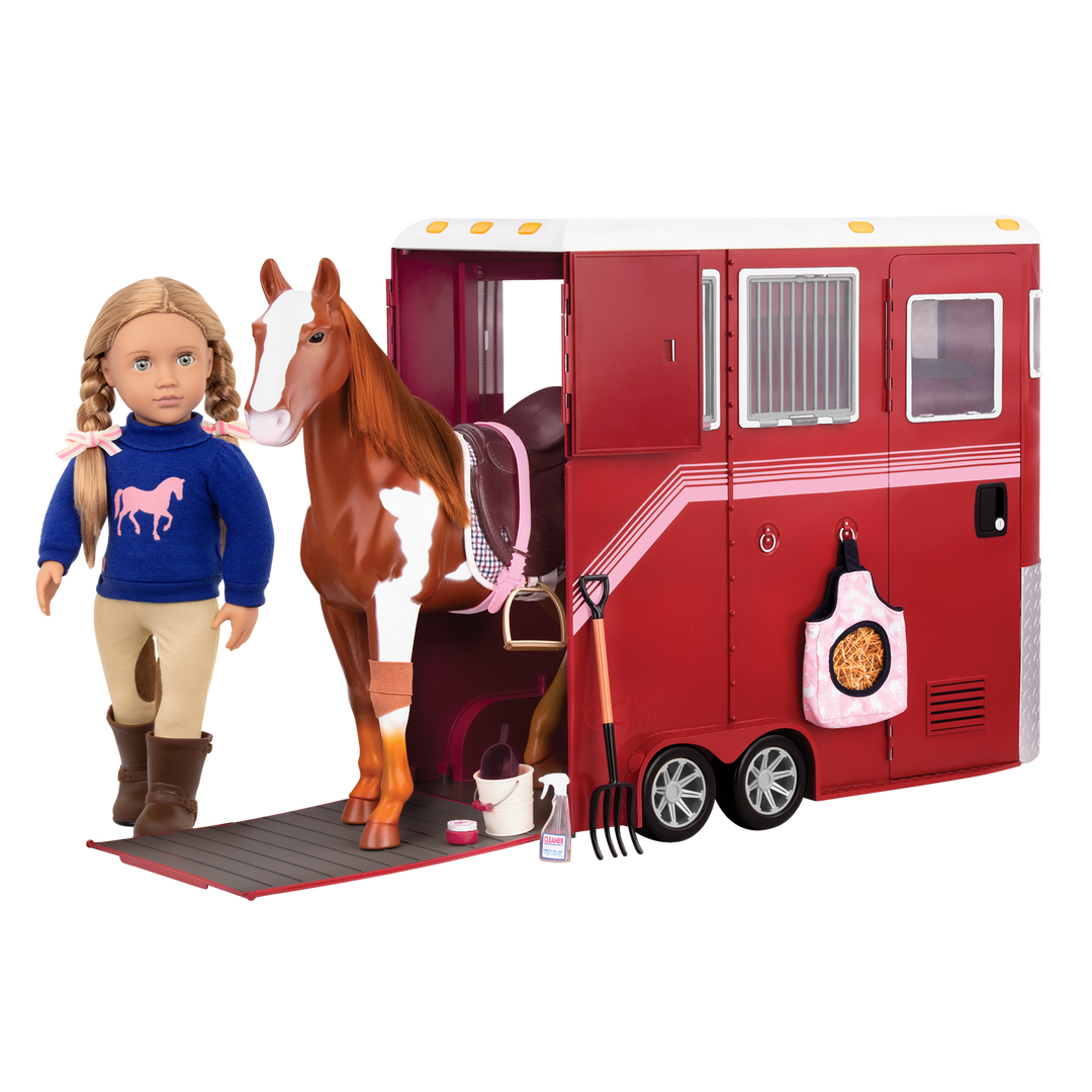 18-inch equestrian doll with blonde hair and green eyes