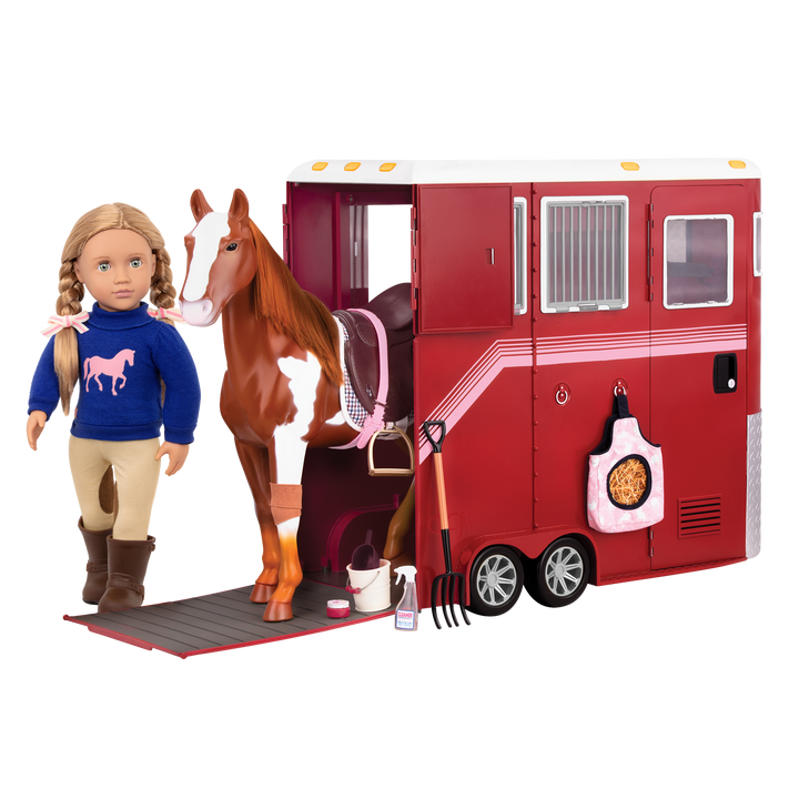 18-inch equestrian doll with blonde hair and green eyes