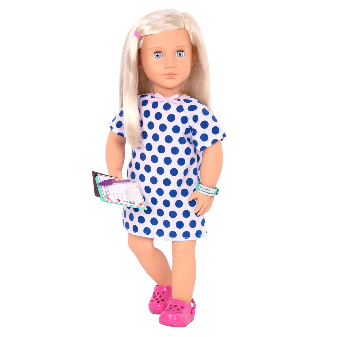 18-inch doll with blonde hair, pale blue eyes, hospital accessories and storybook