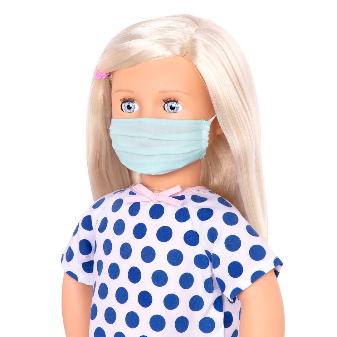 18-inch doll with blonde hair, pale blue eyes, hospital accessories and storybook