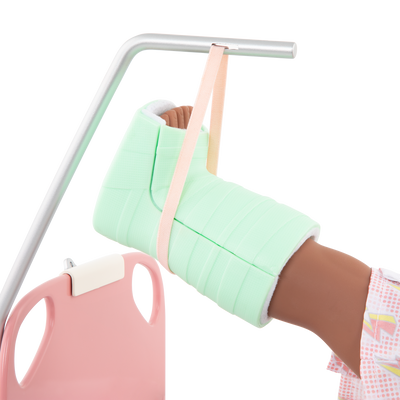 Two 18-inch dolls with hospital gurney playset
