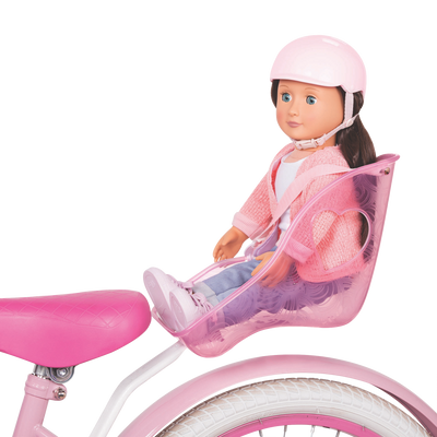 18-inch doll in toy bike seat