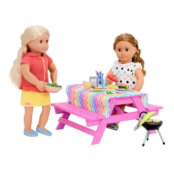 Two 18-inch dolls with picnic table playset