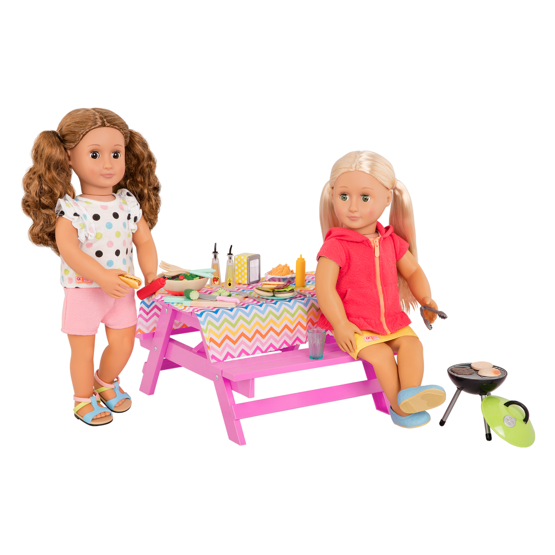 Two 18-inch dolls with picnic table playset