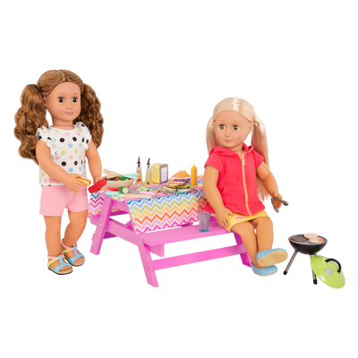 Two 18-inch dolls with picnic table playset